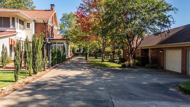 view of side of property featuring a garage