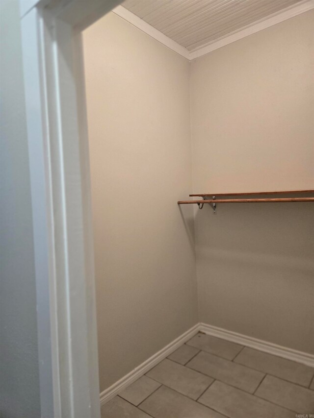 spacious closet featuring tile patterned floors