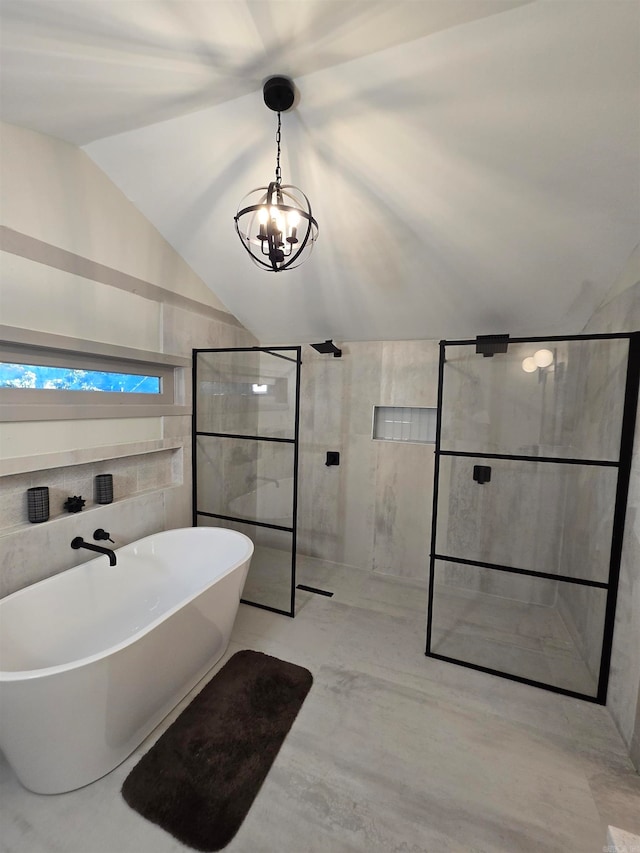 bathroom featuring lofted ceiling, shower with separate bathtub, and an inviting chandelier