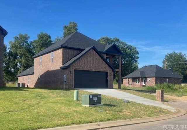 view of property exterior with a yard and a garage