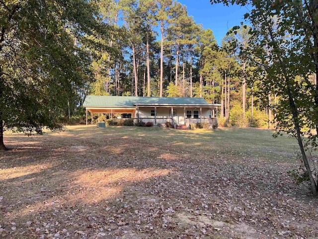 view of front facade with a carport