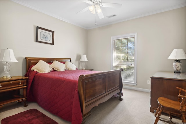 bedroom featuring light carpet, ornamental molding, baseboards, and a ceiling fan