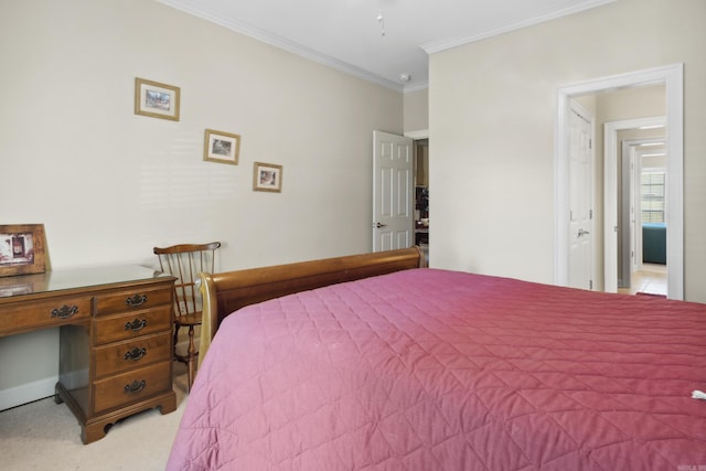 bedroom with crown molding and light carpet