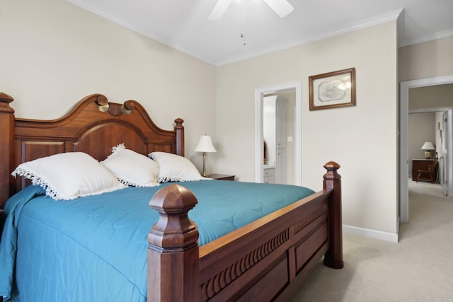 bedroom with light carpet, crown molding, baseboards, ensuite bathroom, and ceiling fan