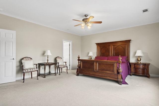 bedroom featuring light colored carpet, crown molding, baseboards, and a ceiling fan