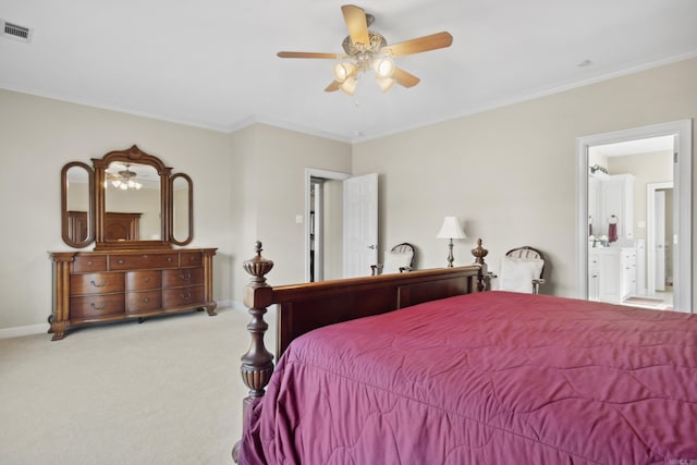 bedroom featuring carpet, baseboards, crown molding, ensuite bath, and a ceiling fan