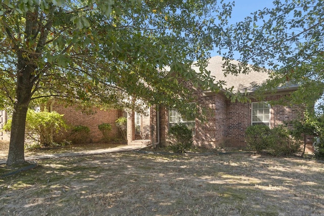 view of front of property with brick siding