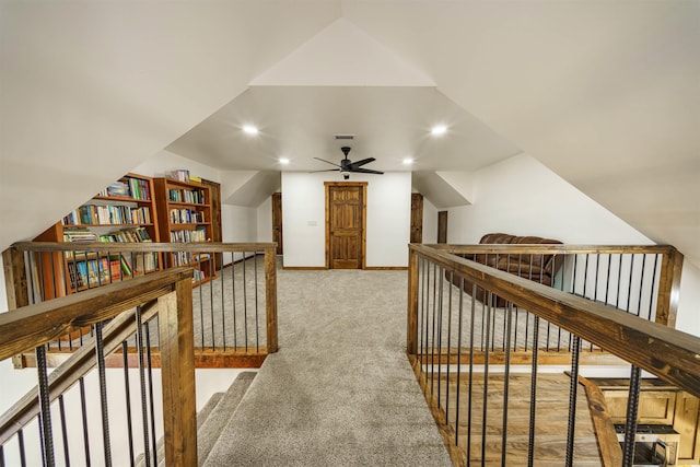 hallway with light carpet