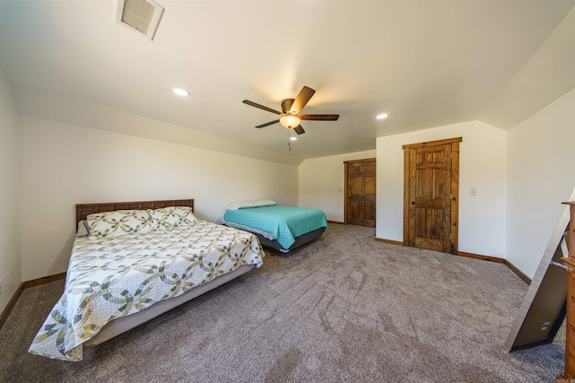 unfurnished bedroom with dark colored carpet and ceiling fan