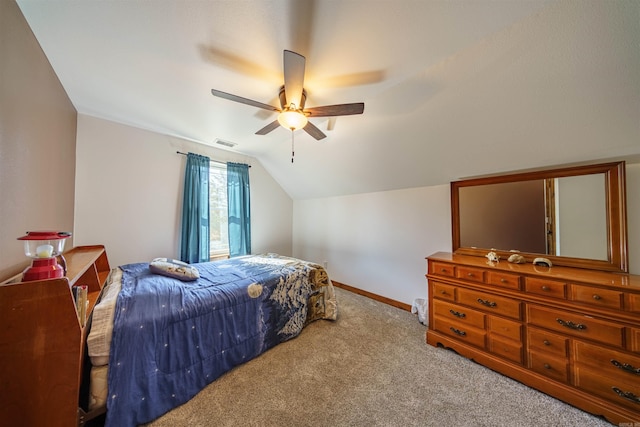 bedroom featuring lofted ceiling, carpet flooring, and ceiling fan