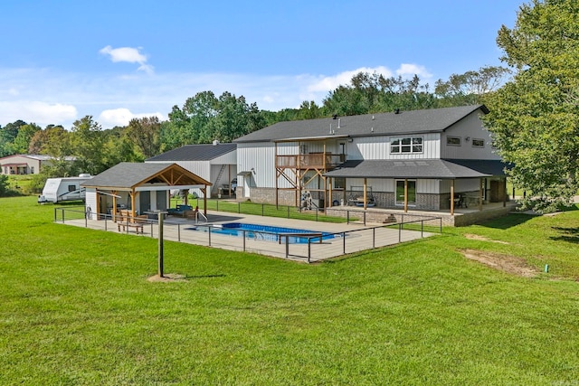 view of swimming pool with a gazebo, a yard, and a patio area