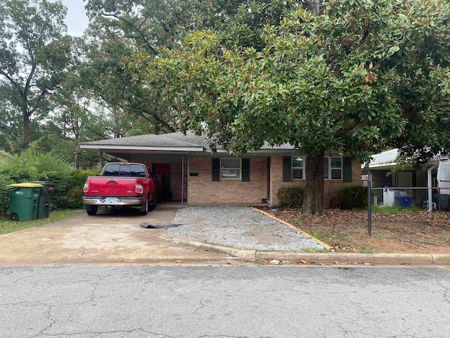 view of front of house featuring a carport