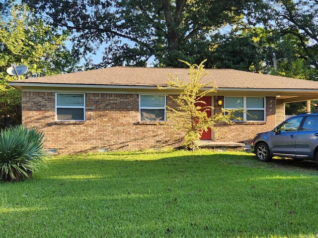 4028 Arapaho Trl, Little Rock, AR 72209 - view of front of home with brick siding, a front yard, and crawl space