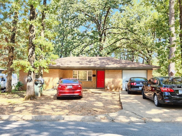 single story home with a garage