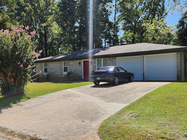 single story home featuring a front yard and a garage