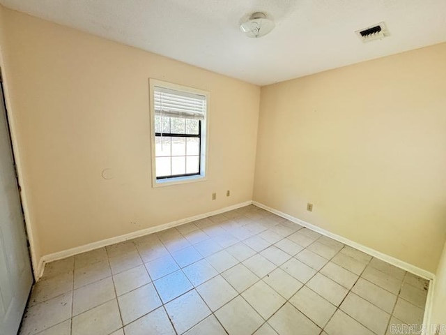 view of tiled empty room