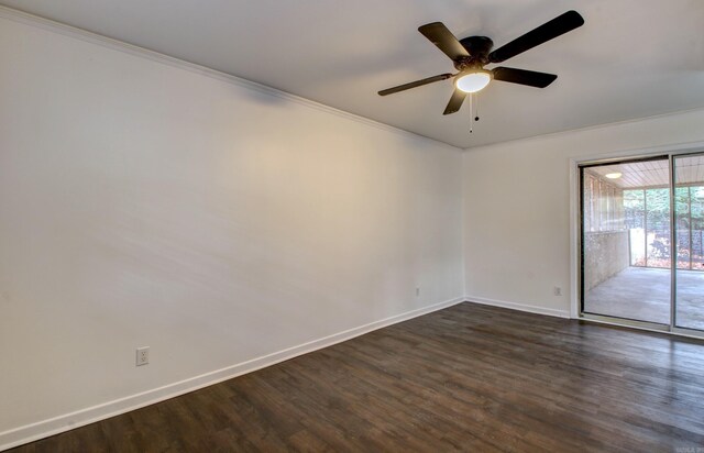 empty room with ceiling fan, crown molding, and dark hardwood / wood-style floors