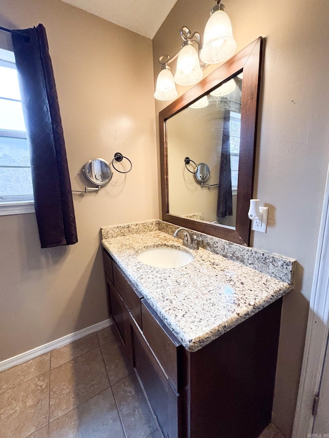 bathroom featuring vanity and tile patterned flooring