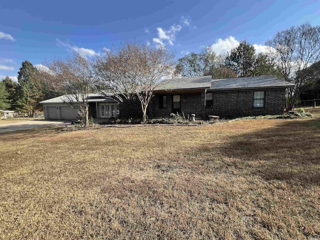 8096 Zuber Rd, Benton, AR 72019 - view of front facade featuring a front lawn, concrete driveway, and an attached garage