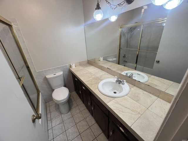 8096 Zuber Rd, Benton, AR 72019 - full bathroom with toilet, vanity, tile patterned floors, and combined bath / shower with glass door