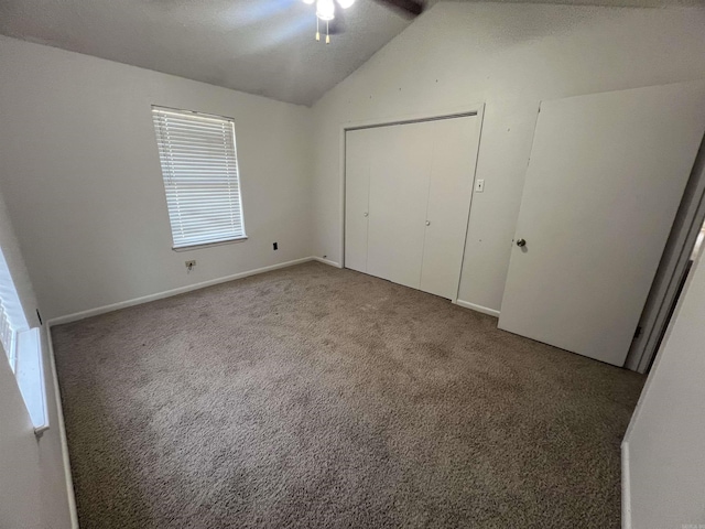 8096 Zuber Rd, Benton, AR 72019 - unfurnished bedroom featuring lofted ceiling, carpet flooring, a closet, ceiling fan, and baseboards