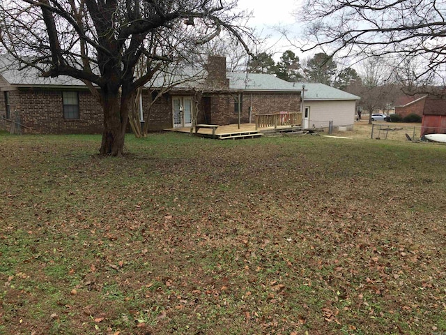 view of yard featuring a deck