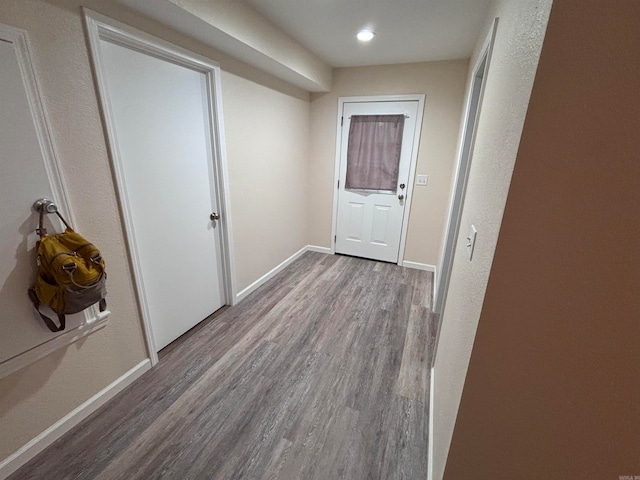 hallway featuring hardwood / wood-style floors