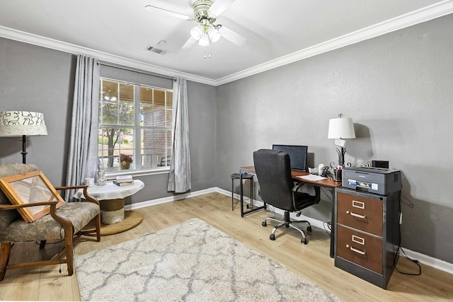 office featuring light hardwood / wood-style floors, crown molding, and ceiling fan