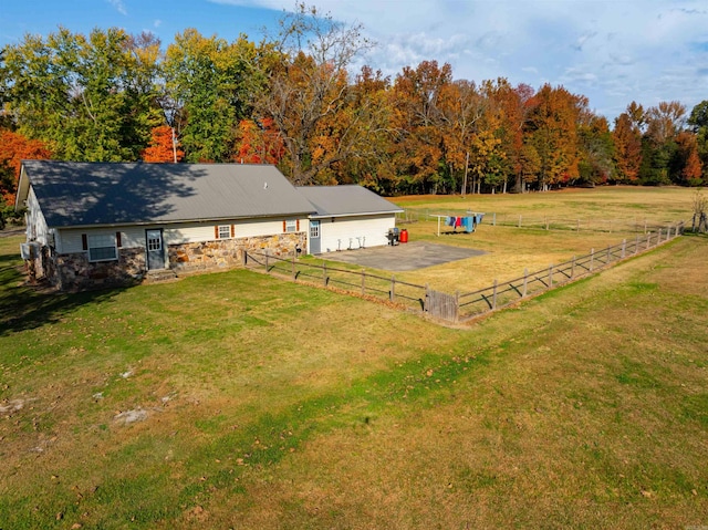 exterior space with a rural view