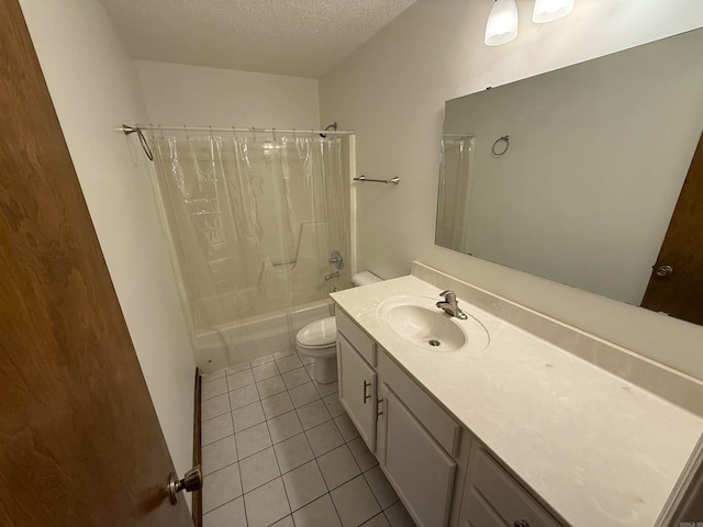 full bathroom with a textured ceiling, toilet, vanity, shower / tub combo with curtain, and tile patterned flooring