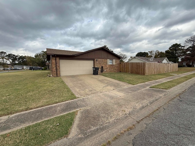 view of property exterior featuring a lawn and a garage