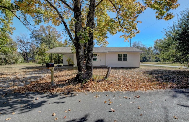 1321 S Pear St, Pine Bluff, AR 71603 - view of front of house featuring a carport