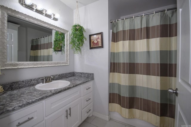 bathroom featuring vanity, tile patterned floors, and a shower with curtain