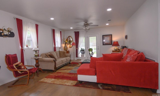 living area featuring recessed lighting, ceiling fan, and wood finished floors