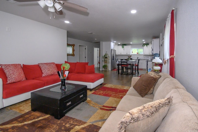 living room with recessed lighting, finished concrete floors, and ceiling fan