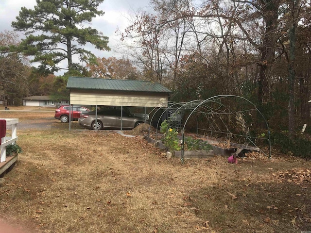 view of yard featuring a carport