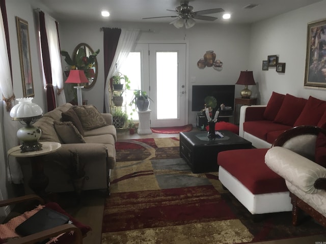 living room with recessed lighting, ceiling fan, and visible vents