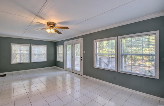 unfurnished room featuring ceiling fan, light tile patterned floors, and plenty of natural light