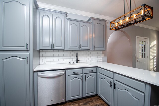 kitchen featuring hanging light fixtures, ornamental molding, dishwasher, gray cabinets, and sink