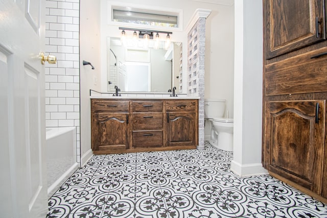 full bathroom featuring vanity, toilet, tile patterned flooring, and plus walk in shower