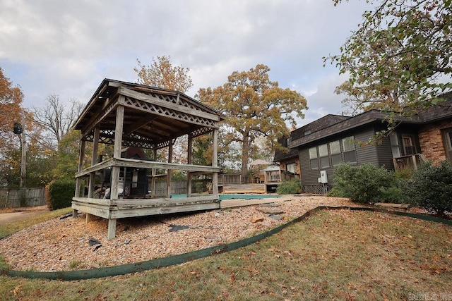 exterior space with a pool side deck and a sunroom