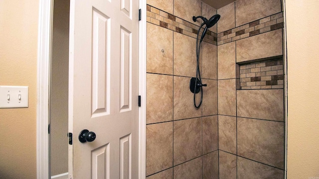 details featuring a tile shower