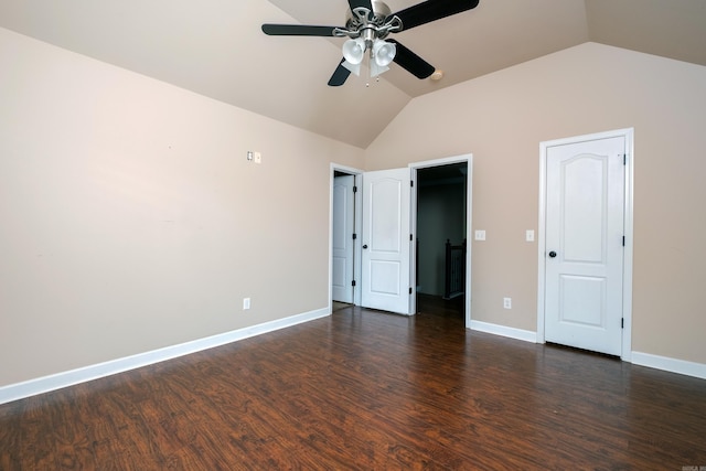 unfurnished bedroom with dark wood-type flooring, vaulted ceiling, and ceiling fan