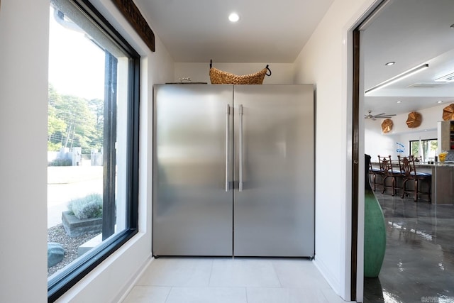 kitchen featuring stainless steel refrigerator