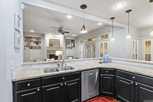 kitchen with dishwasher, hanging light fixtures, ornamental molding, sink, and ceiling fan