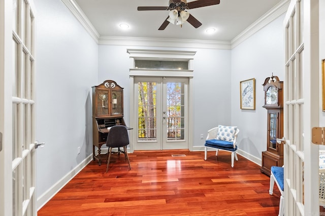 living area featuring french doors, ceiling fan, hardwood / wood-style flooring, and ornamental molding