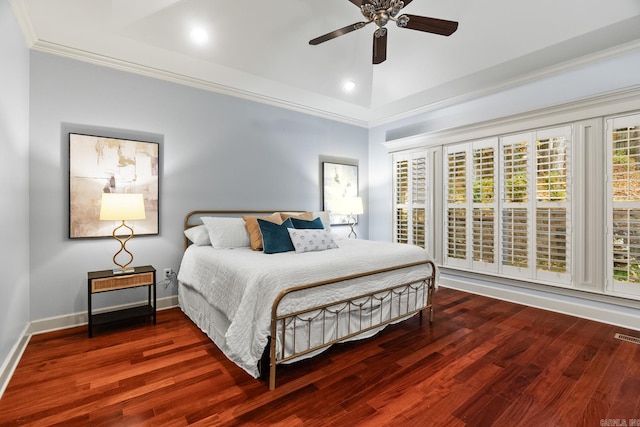 bedroom with dark wood-type flooring, ceiling fan, and crown molding