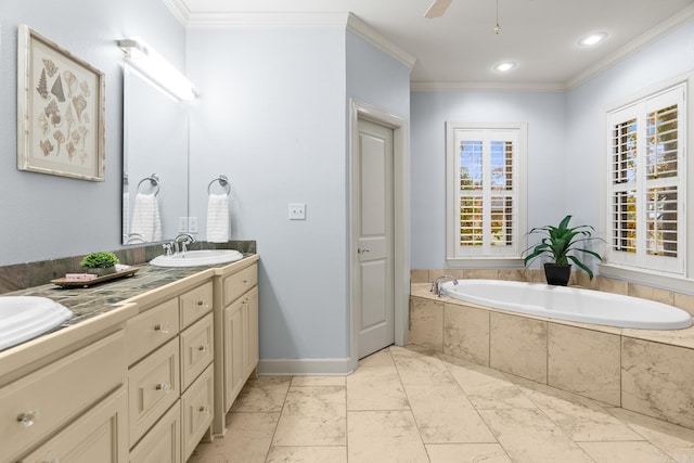 bathroom with vanity, a relaxing tiled tub, ornamental molding, and ceiling fan