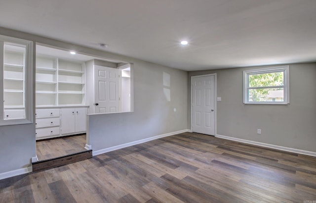 basement with dark wood-type flooring