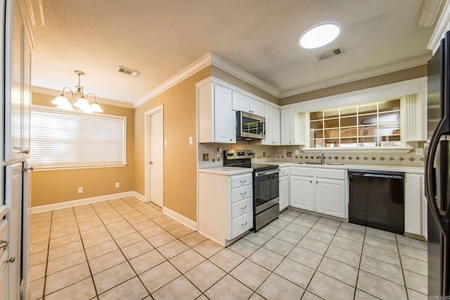 kitchen with decorative backsplash, white cabinetry, crown molding, decorative light fixtures, and stainless steel appliances